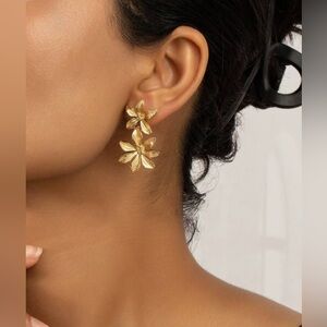 Gold floral drop earrings with boho statement double flower design